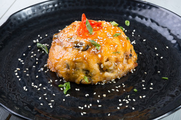 Salmon with mushrooms baked with cheese