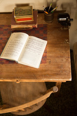 Open book on antique table