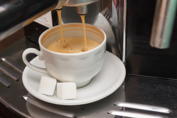 Making coffee in a carob coffee machine