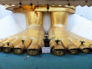 Big Standing Golden Buddha Wat Intharawihan in Bangkok, Thailand