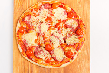 Pizza on a wooden board