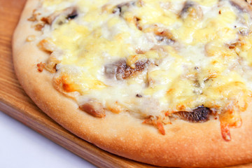 Pizza on a wooden board