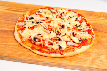 Pizza on a wooden board