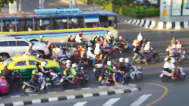 Abstract blur traffic at Bangkok downtown intersection 