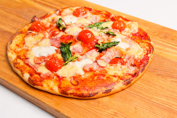 Pizza on a wooden board