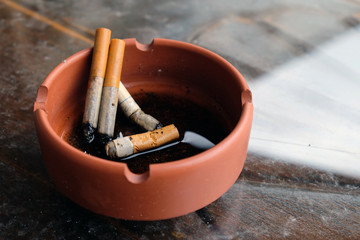 Used cigarettes in the ashtray