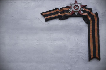 Tape and victory award on concrete wall