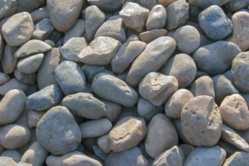 Pebble stones for background. Abstract background and texture with white pebbles. Stones texture and background. Garden decoration. Abstract texture and background for designers. 