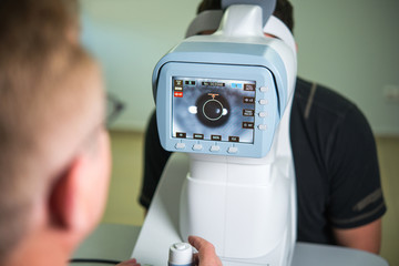 The ophthalmologist conducts the research with the help of various equipment, a contactless...