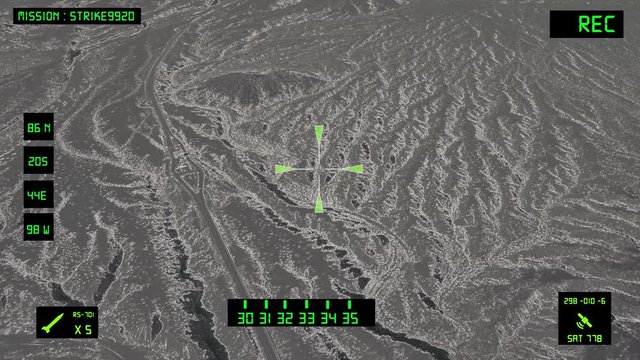 Viewfinder of a military helicopter / plane looking for a target to shoot and bomb. Desert area.