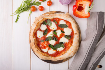 Pizza on wooden board