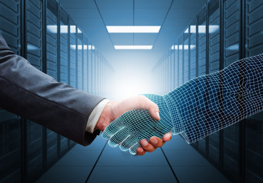 businessman shaking hand with 3d wireframe hand 