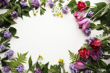 Tulips and lilacs and leaves top view