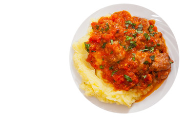 Meatballs in tomato sauce with mashed potato. top view. isolated on white