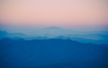 Fototapeta na wymiar Beautiful sunset in mountain and fog landscape.