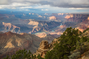 Awesome Landscape of Grand Canyon with the Colorado River visible during dusk