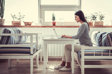Girl working in cafe