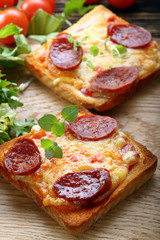 Fresh toast with cheese and chorizo sausage