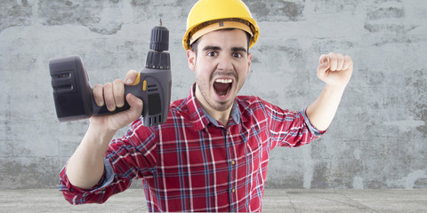 worker with drill screaming euphoric