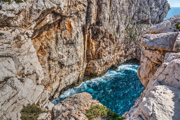 Cliff and blue sea in Capo Caccia