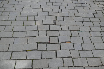 broken pattern of street cobble pavement