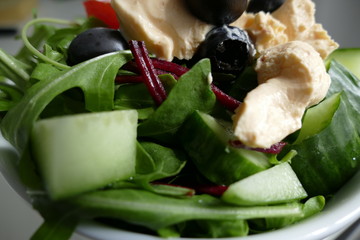 fresh vegetable salad with rucola and tomato