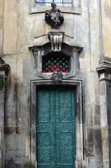 Metal green door with window from above