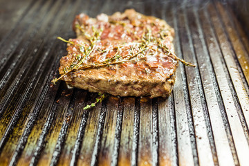 closeup of a steak on grill