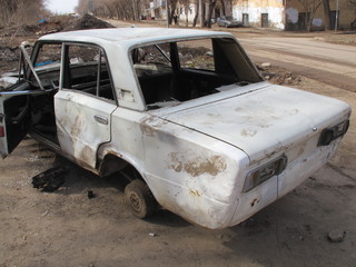 Hijacked and a crashed car in the spring city street
