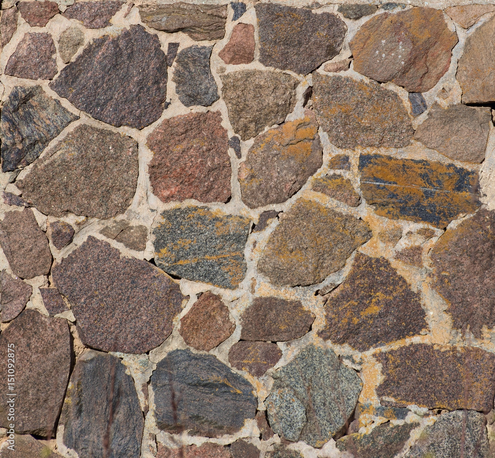 Wall mural Texture of a wall with cobblestones and mortar