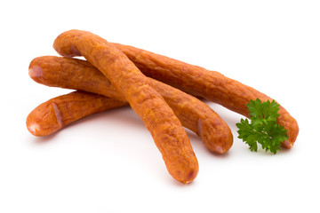 Stack of smoked sausages isolated on a white background.