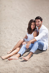 Fototapeta premium happy couple in love on beach,selective focus.