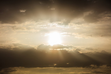Light beams shining trough the clouds