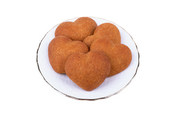 Honey heart shaped cookies isolated on white background.