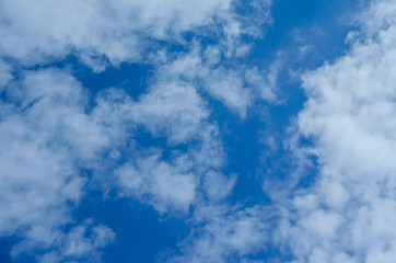 White clouds in deep blue sky