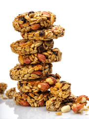 Briquettes of sunflower seeds, candied sugar, caramel or honey on white background