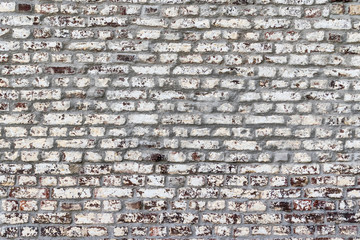 White painted red brick wall background wide shot