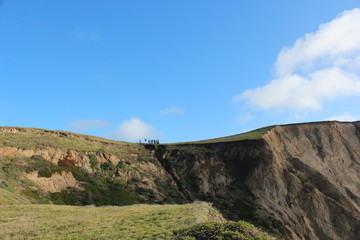 Fototapeta na wymiar People on a Cliff
