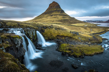 Kirkjufell mountain the iconic tourist attraction in west region of Iceland.