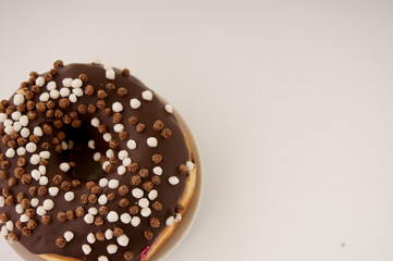 donuts on a plate on a white background