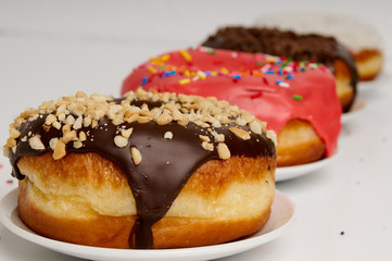 donuts on a plate on a white background