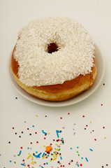 donut on a plate on a white background