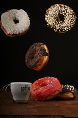 air donuts and coffee on a table