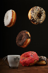 air donuts and coffee on a table