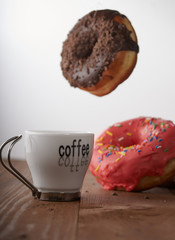 air donuts and coffee on a table
