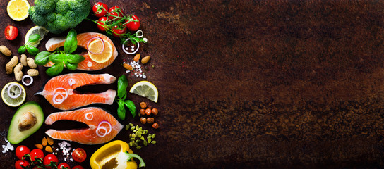 Salmon fillet, fish on wooden background with free space for your text. Top view. Healthy food, diet or cooking concept.