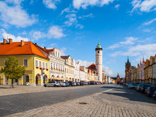 Fototapeta na wymiar Peace Square with White Tower of Domazlice on sunny day, Czech Republic.