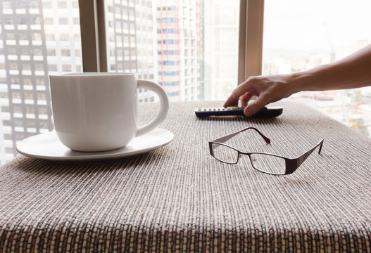 Man relaxing in a modern city apartment. Day off , taking a break concept.  - Powered by Adobe