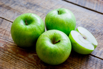 fresh organic green fruits with apples on rustic background