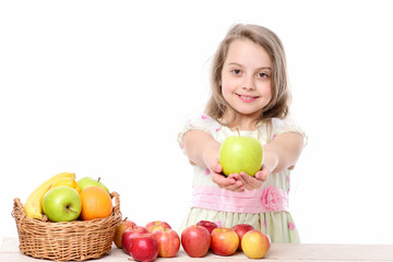 Fototapeta na wymiar small happy girl eating exotic fruit or summer background